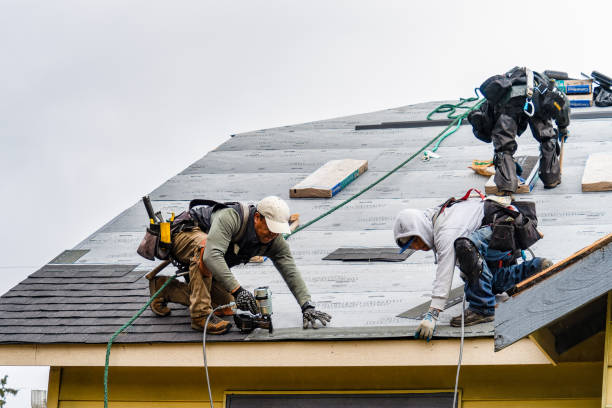 Professional Roofing technician working in Warren, IN